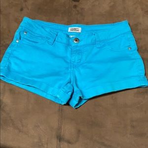 Bright blue stretchy jean shorts